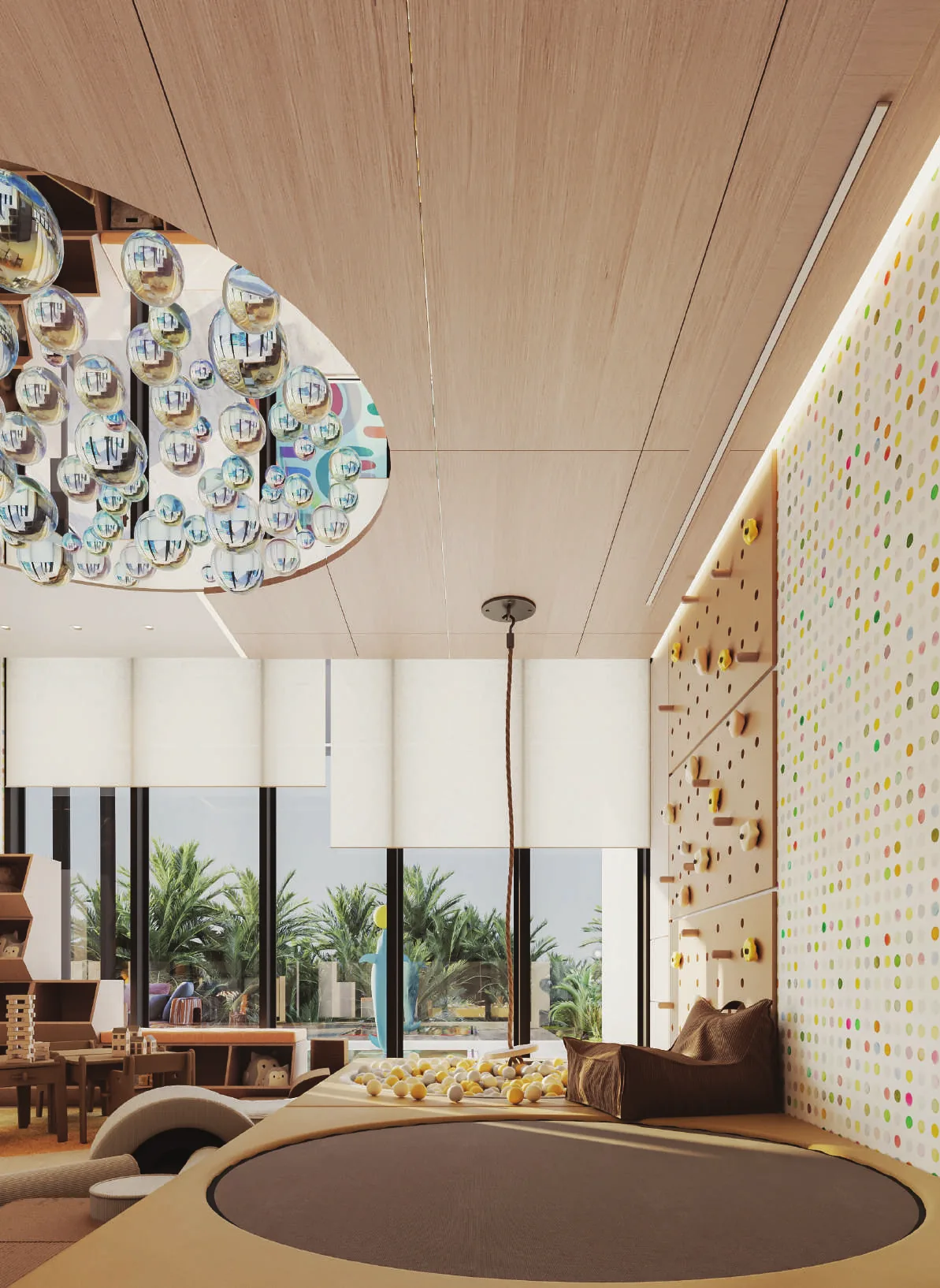 Indoor crèche with a climbing wall, soft play and a bubble ceiling installation
